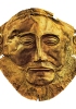 La cosiddetta «maschera di Agamennone» una maschera funeraria trovata nelle tombe reali di Micene, 1600-1500 a.C. circa. Schliemann attribuì la maschera al capo dei Greci nella guerra di Troia, ma in realtà la tomba era di alcuni secoli più antica. (Atene, Museo archeologico nazionale)