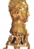 Alla base della testa è rappresentata la città di Roma a simboleggiare il dominio dell’imperatore sulla città. Testa in bronzo dorato del 1160 conservata nella cattedrale di Kappenberg.