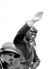 Mussolini in veste di aviatore saluta «romanamente». Al suo fianco, Italo Balbo. Fotografia del 1937. (Parimage/Imapress)