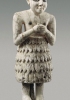 Statuetta votiva di Eannatum, re di Lagash, in atteggiamento di preghiera, ca 2600-2340 a.C. Alabastro calcareo con lapislazzuli e madreperla, altezza 30 cm. Houston, Menil Collection. 